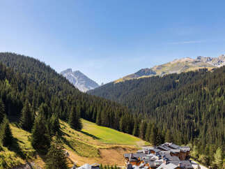 Nestled in a picturesque mountain valley, this property offers stunning views of the surrounding natural beauty.