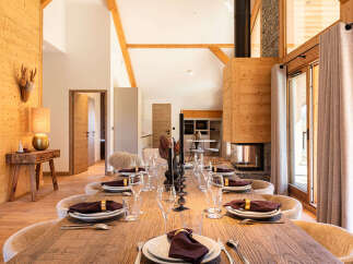 Experience luxury living in this stunning property featuring a spacious dining area.