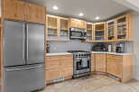 This stunning kitchen boasts a modern design with stainless steel appliances and custom cabinetry.