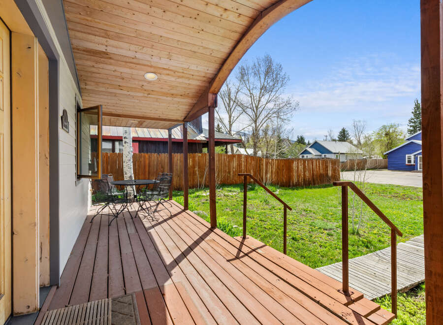 Step into the charm of this inviting porch, perfect for enjoying the outdoors.