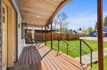 Step into the charm of this inviting porch, perfect for enjoying the outdoors.
