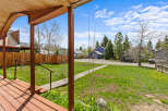 Step onto the inviting porch of this charming property and take in the serene surroundings.