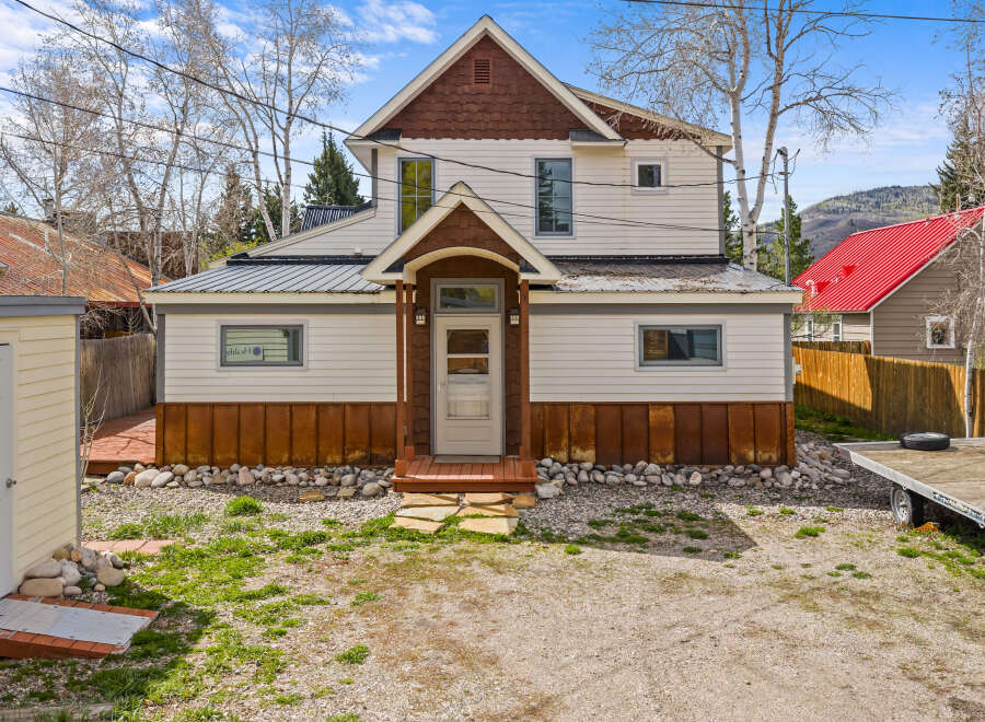 Charming two-story home with a unique architectural design.
