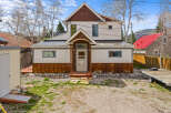 Charming two-story home with a unique architectural design.