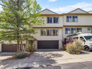 Discover this stunning townhome featuring a modern design and ample space.