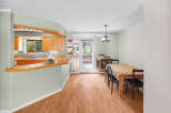 Step into this inviting home featuring a bright and airy dining area, perfect for entertaining.