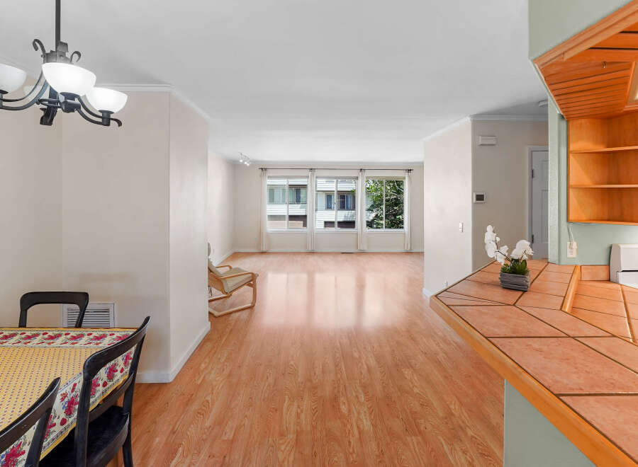 Step into this inviting space with beautiful hardwood floors and ample natural light.