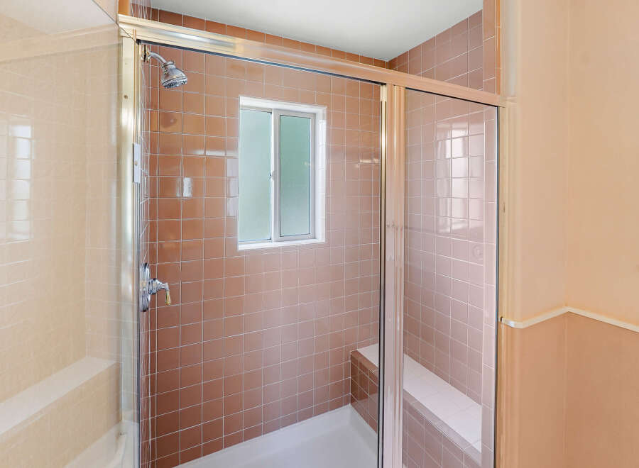 Step into this charming bathroom featuring a classic design and functional layout.