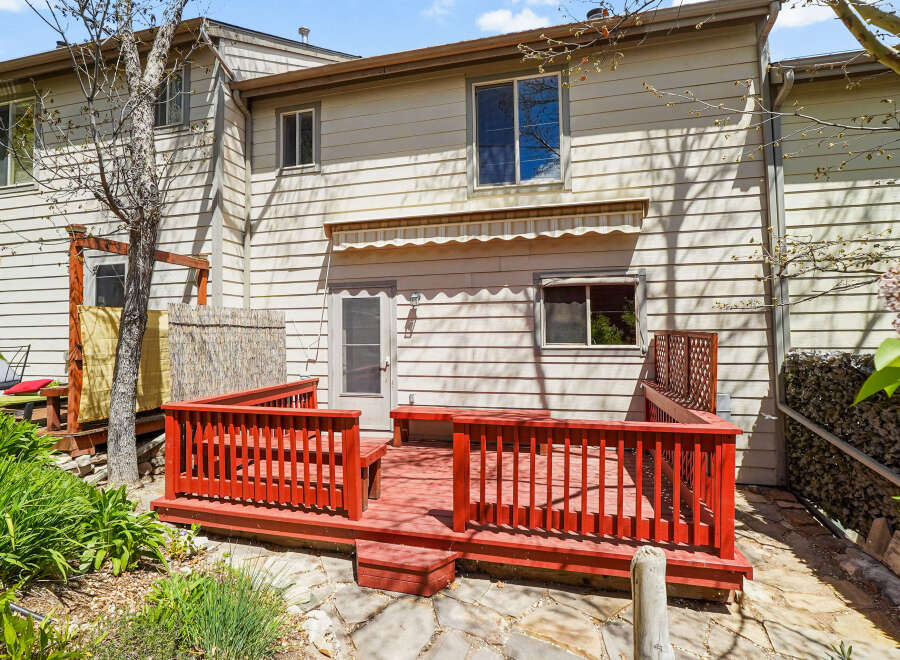 Enjoy outdoor living on this charming deck! This property features a beautifully designed deck, perfect for entertaining or relaxing.