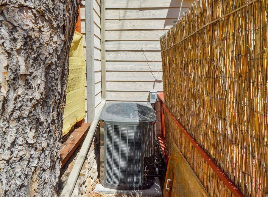 This property features a well-maintained air conditioning unit, ensuring comfort during warmer months.