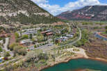 Discover a stunning property nestled in a picturesque mountain town, offering breathtaking views and a serene atmosphere.