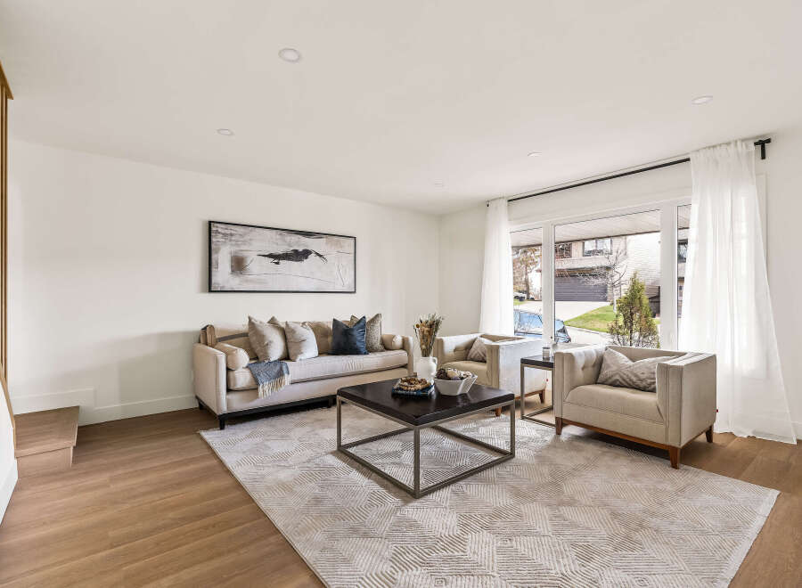 Step into this inviting living room, perfect for relaxation and entertaining.