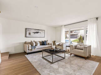 Step into this inviting living room, perfect for relaxation and entertaining.
