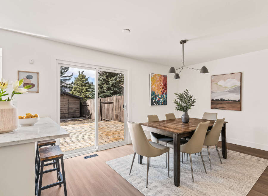 Step into this inviting dining area, perfect for both everyday meals and entertaining.
