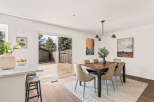 Step into this inviting dining area, perfect for both everyday meals and entertaining.
