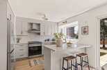 This stunning kitchen boasts modern design and functionality.