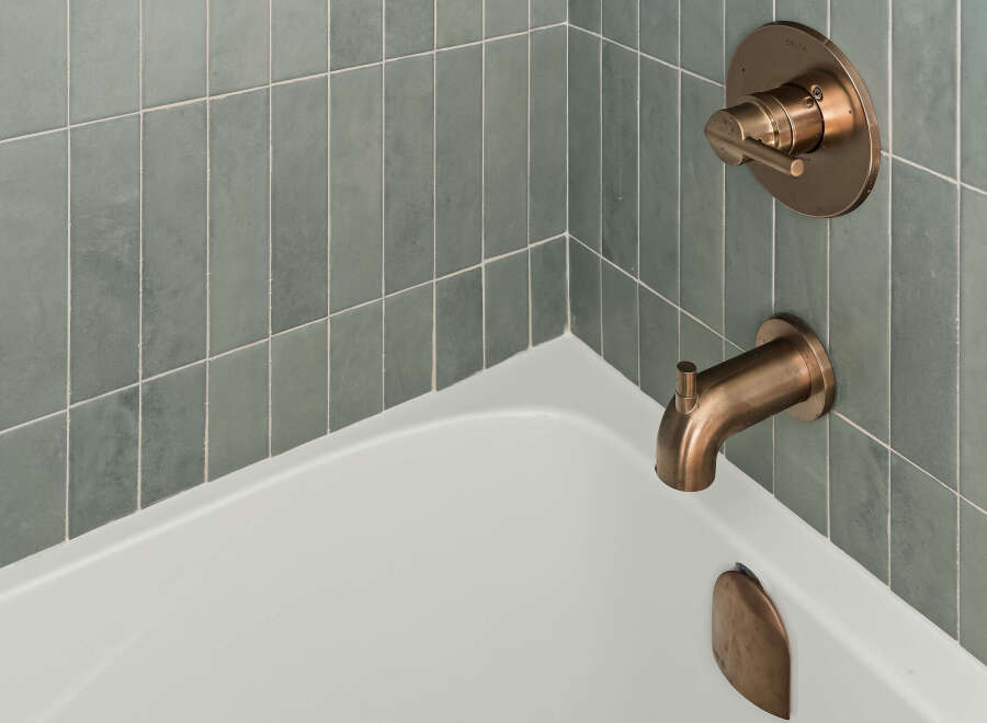 This bathroom features a stylish combination of modern design and functionality.