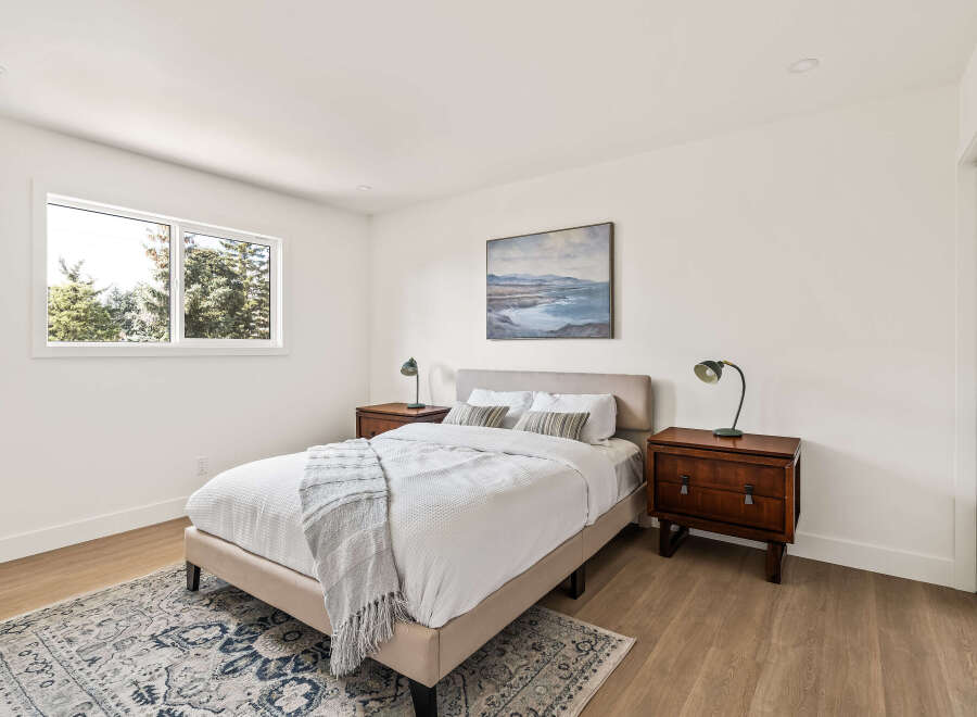 This inviting bedroom features a comfortable bed, perfect for relaxation.