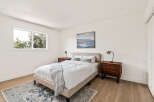 This inviting bedroom features a comfortable bed, perfect for relaxation.