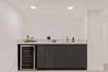 This stunning wet bar is the perfect addition to any home, offering both style and functionality.