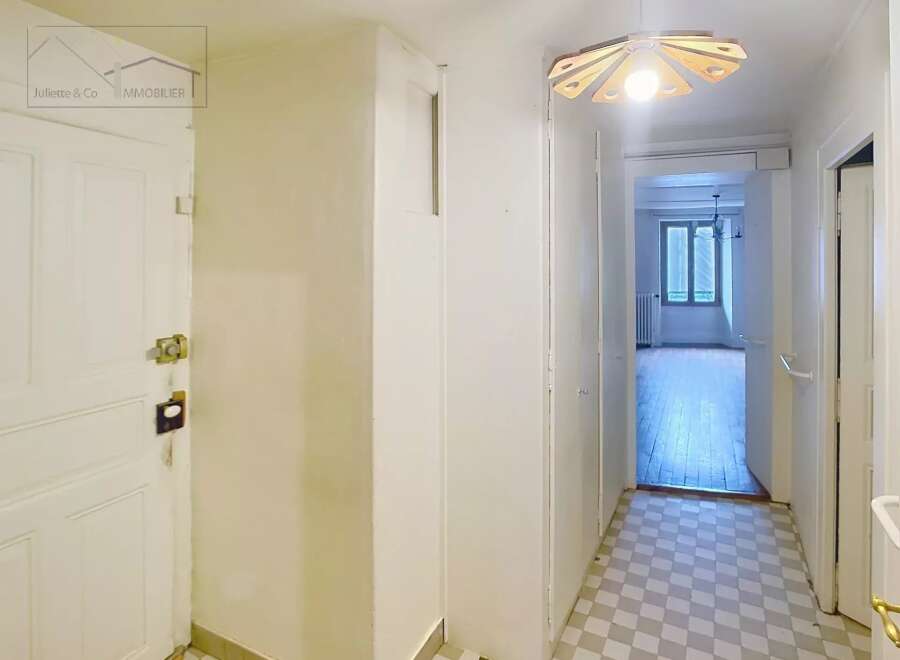 Step into this inviting property and discover a bright hallway leading to various rooms.