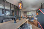 Experience luxury living in this stunning property, featuring a modern interior design with a touch of rustic charm.
