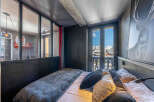 Experience the charm of this cozy bedroom with stunning mountain views.