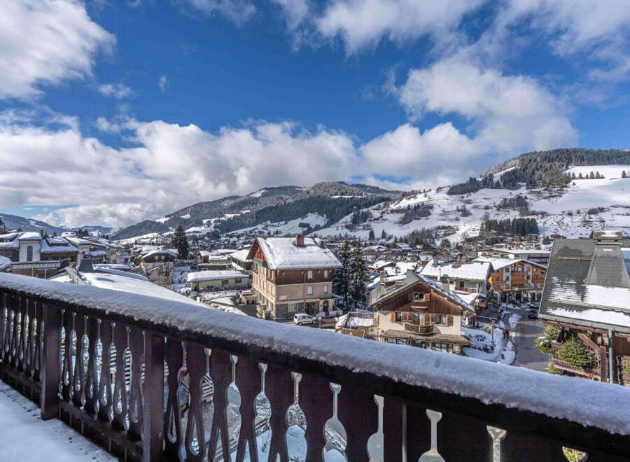 Enjoy breathtaking mountain views from this charming property.