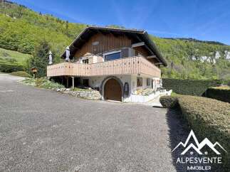 Discover this charming property nestled in a picturesque setting, offering a blend of rustic charm and modern comfort.