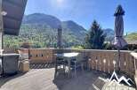 Enjoy breathtaking mountain views from this stunning property! This home features a spacious deck, perfect for outdoor dining and relaxation.