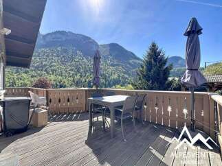 Enjoy breathtaking mountain views from this stunning property! This home features a spacious deck, perfect for outdoor dining and relaxation.