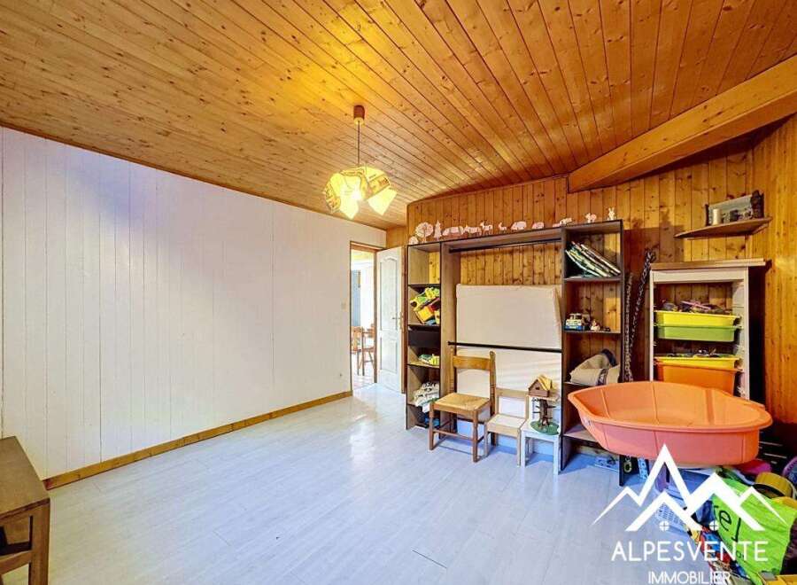 Discover this charming property featuring a cozy interior with wooden accents and a bright, inviting atmosphere.