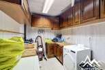 Discover this charming property featuring a well-equipped laundry room, perfect for everyday convenience.