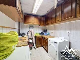 Discover this charming property featuring a well-equipped laundry room, perfect for everyday convenience.
