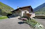 Charming chalet nestled in a picturesque mountain setting, offering a tranquil escape.
