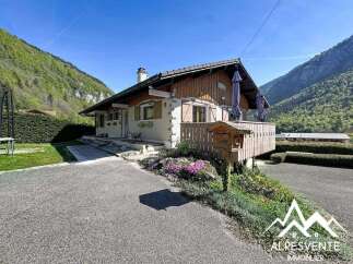 Charming chalet nestled in a picturesque mountain setting, offering a tranquil escape.