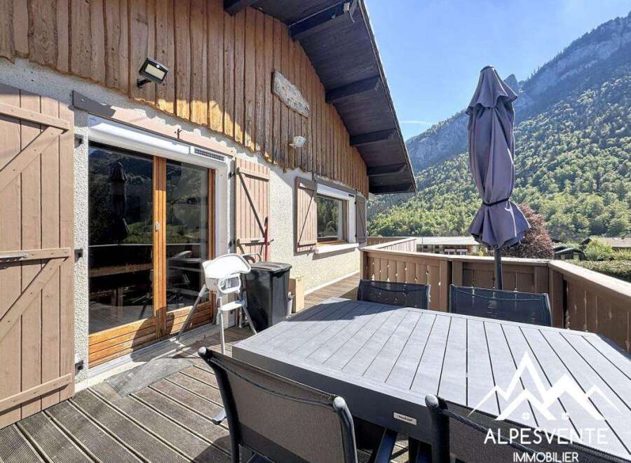 Enjoy breathtaking mountain views from this charming property.