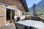 Enjoy breathtaking mountain views from this charming property.