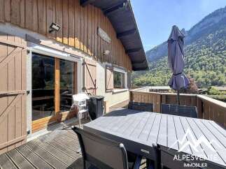 Enjoy breathtaking mountain views from this charming property.