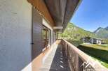 Discover the charm of this property with a stunning balcony overlooking breathtaking mountain views.