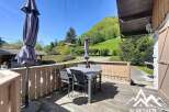 Enjoy breathtaking mountain views from this charming property.