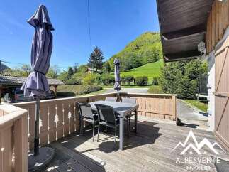 Enjoy breathtaking mountain views from this charming property.