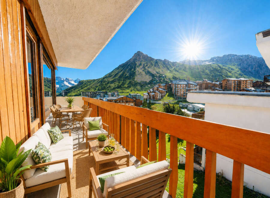 Experience breathtaking mountain views from this stunning balcony, perfect for enjoying your morning coffee or evening cocktails.