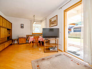Step into this inviting living space, featuring a warm and welcoming ambiance.