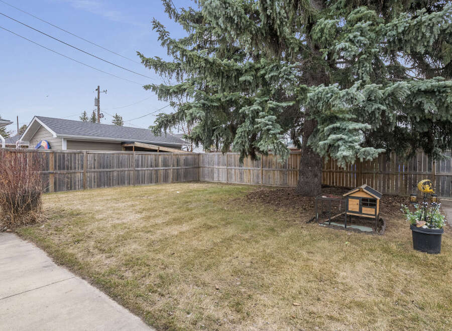 Discover the tranquility of this backyard oasis, perfect for relaxation and outdoor gatherings.