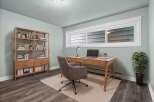 This stylish home office features a modern desk, perfect for remote work or creative projects.