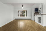 Step into this inviting space, featuring stunning hardwood floors that flow throughout.