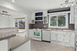 Step into this bright and inviting kitchen, perfect for culinary adventures and family gatherings.