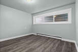 This inviting room features a neutral color palette, creating a versatile space ready for your personal touch.