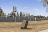 This image showcases a well-maintained off-leash dog area, perfect for pet owners.